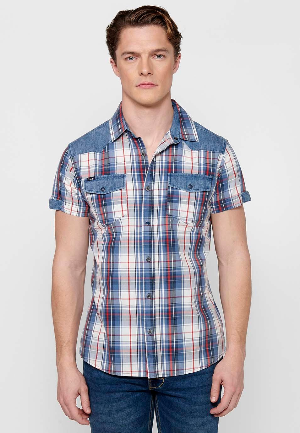 Short-sleeved cotton shirt with turn-up finish with button front closure and front pockets with flaps with a blue checkered print for men 2