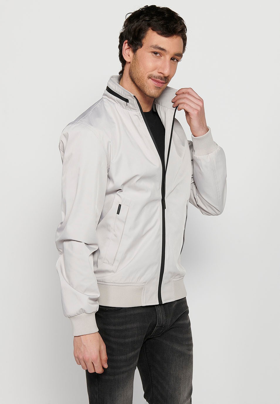 Long-sleeved ribbed-finish jacket with round neck and front zipper closure in Stone Color, for Men