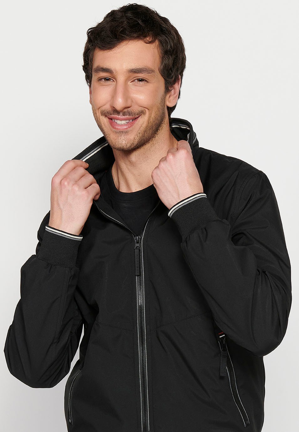 Long-sleeved high-neck windbreaker jacket with front zipper closure and ribbed finishes with pockets, one inside in Black for Men 3