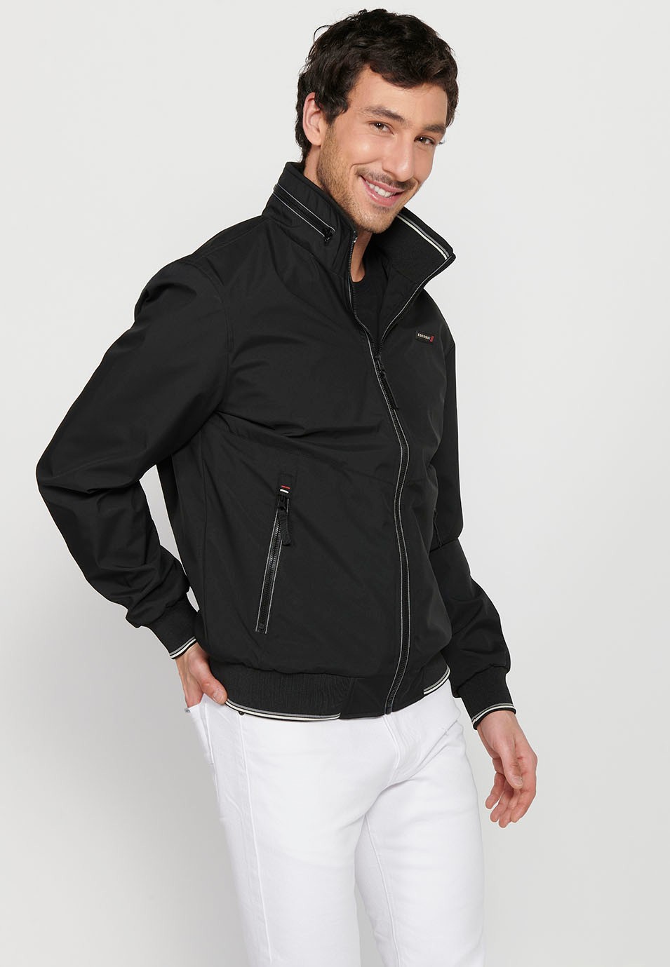 Long-sleeved high-neck windbreaker jacket with front zipper closure and ribbed finishes with pockets, one inside in Black for Men 7