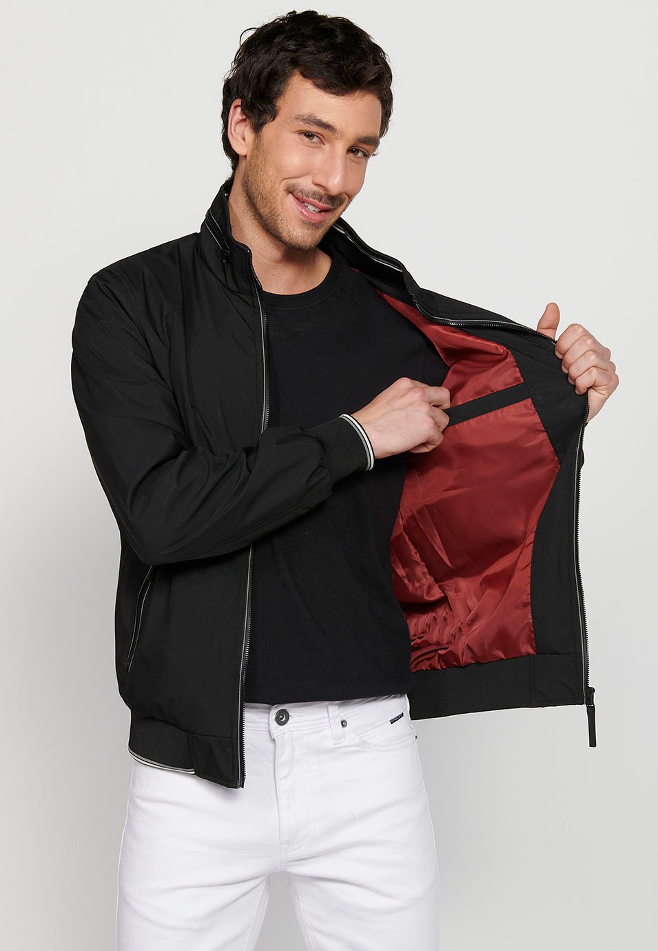 Long-sleeved high-neck windbreaker jacket with front zipper closure and ribbed finishes with pockets, one inside in Black for Men 5