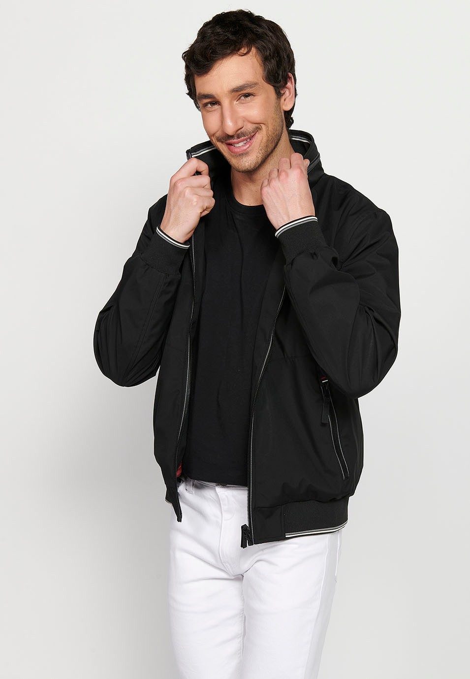 Long-sleeved high-neck windbreaker jacket with front zipper closure and ribbed finishes with pockets, one inside in Black for Men 8