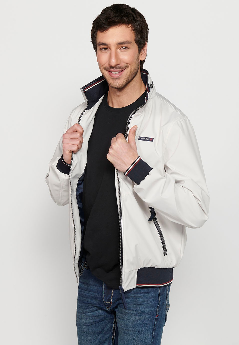 Long-sleeved high-neck jacket with front zipper closure and ribbed finishes with pockets, one inside in Gray for Men