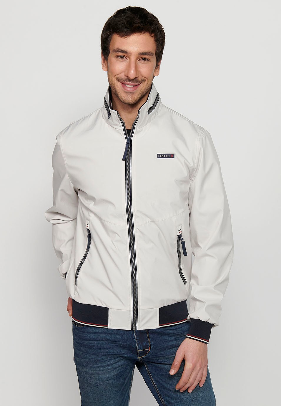 Long-sleeved high-neck jacket with front zipper closure and ribbed finishes with pockets, one inside in Gray for Men