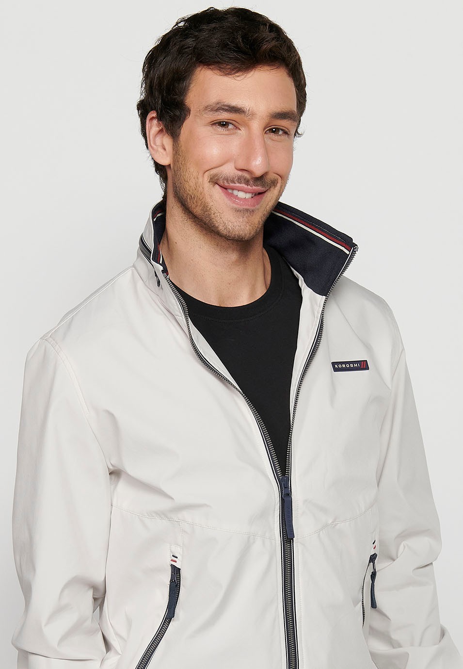 Long-sleeved high-neck jacket with front zipper closure and ribbed finishes with pockets, one inside in Gray for Men