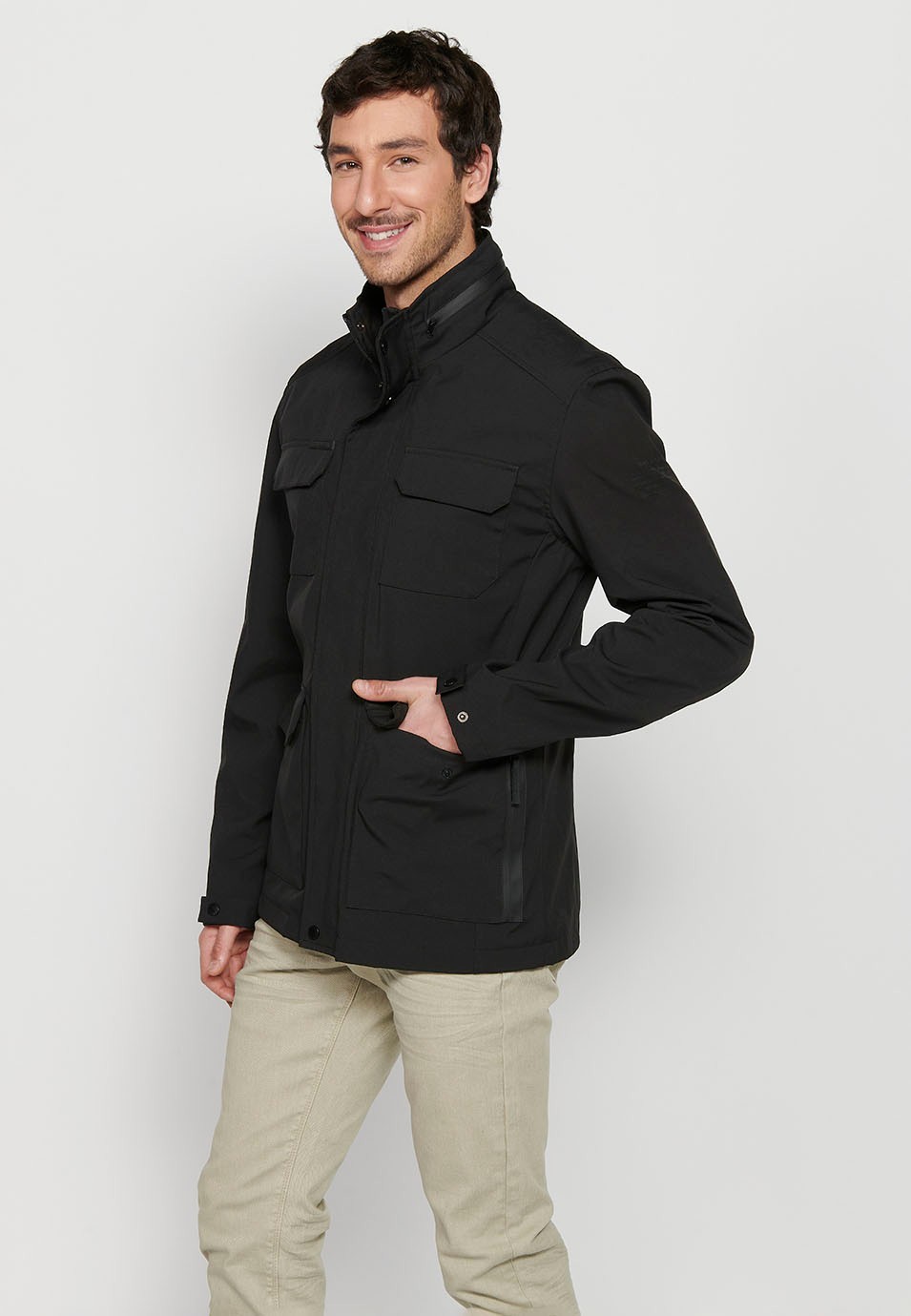 Long Black High Neck Windbreaker Jacket with Front Zipper Closure and Four Flap Pockets for Men