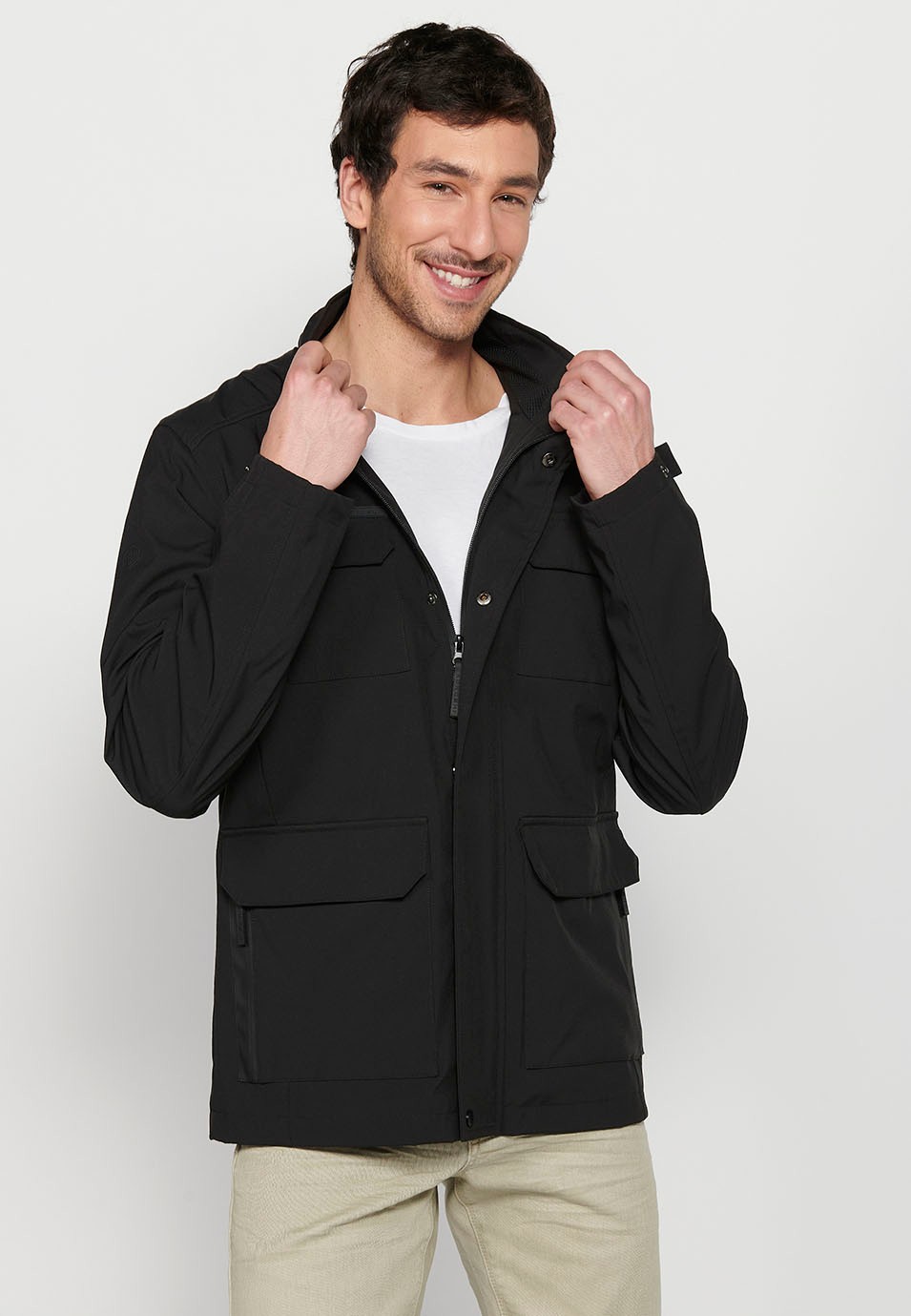 Long Black High Neck Windbreaker Jacket with Front Zipper Closure and Four Flap Pockets for Men 5