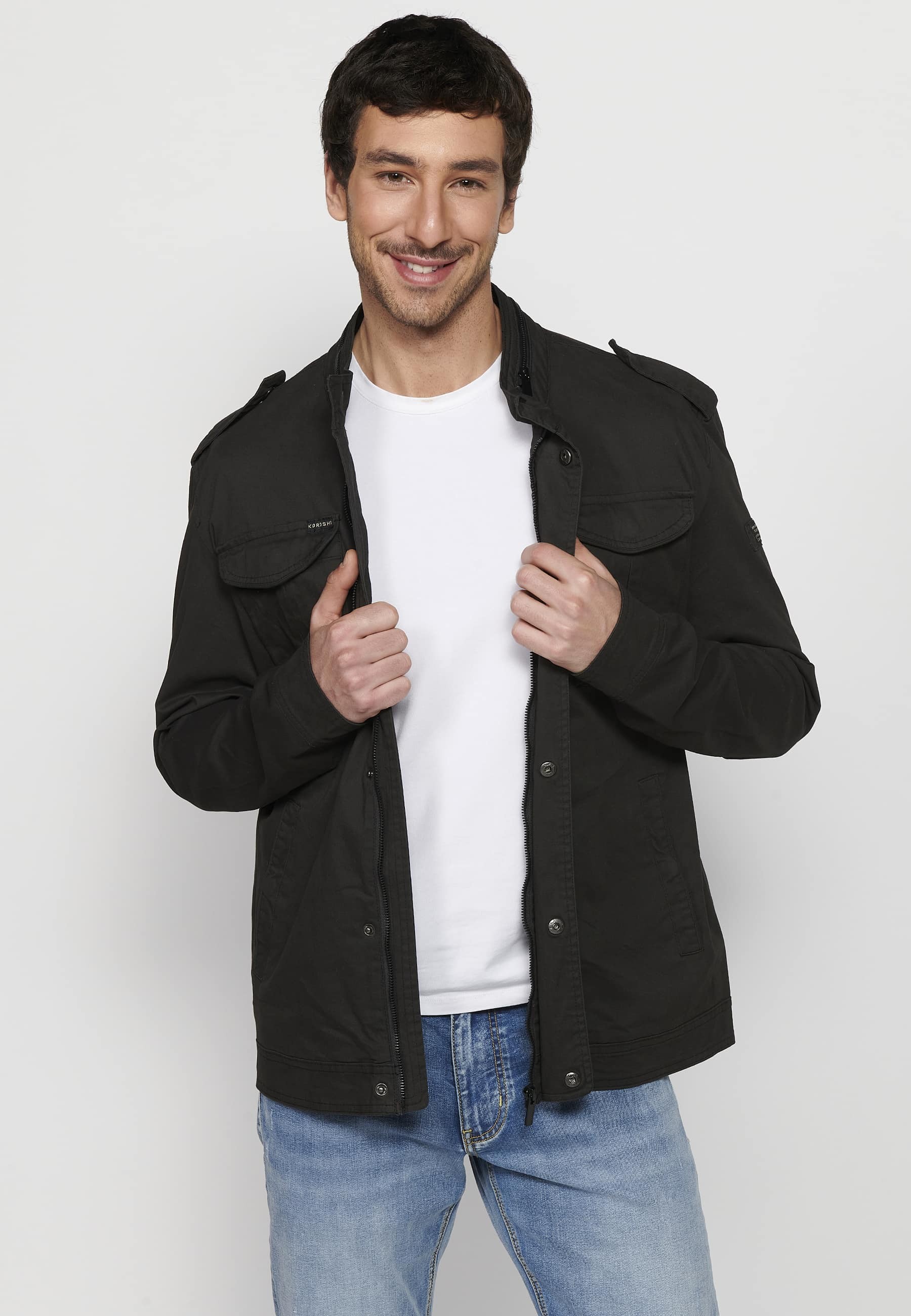 Long-sleeved jacket with high collar and front zipper closure with pockets in black for men. 7