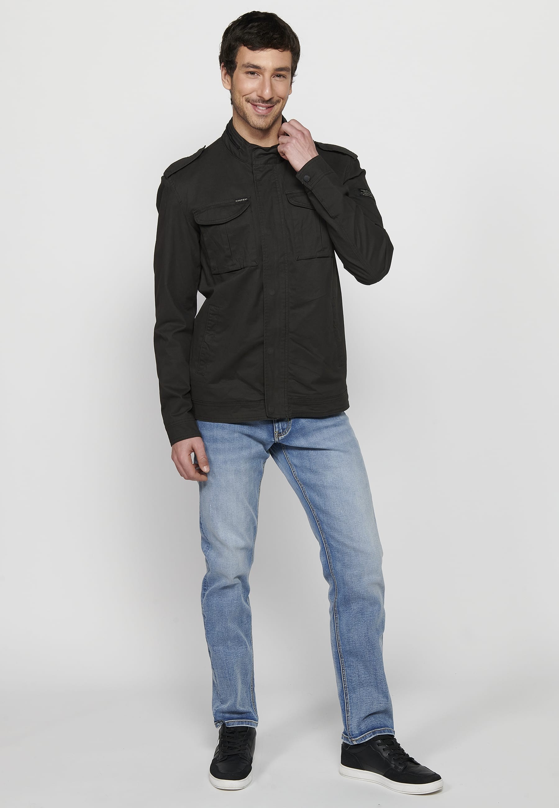 Long-sleeved jacket with high collar and front zipper closure with pockets in black for men. 2