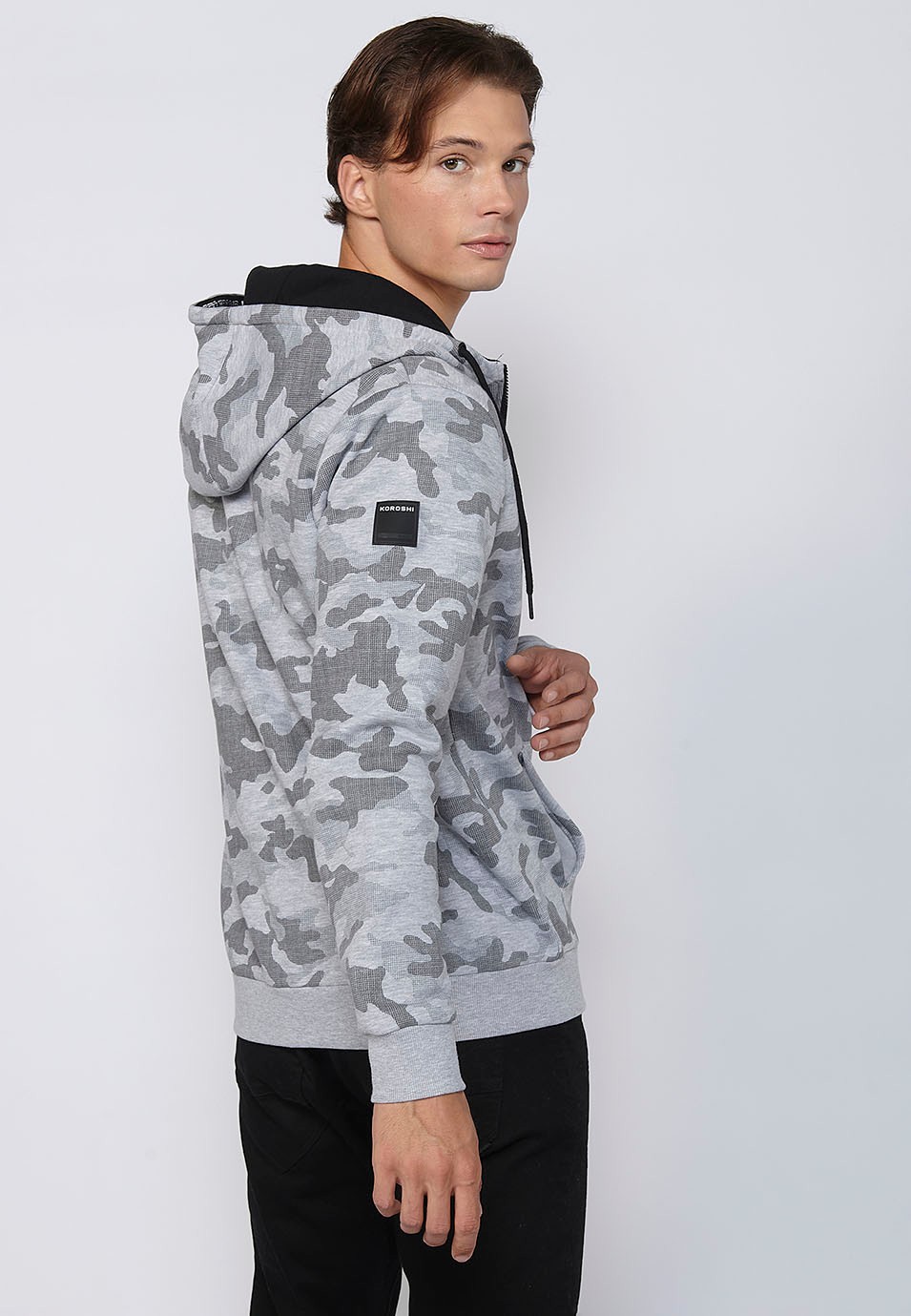 Veste sweat-shirt à manches longues avec col à capuche réglable avec cordon de serrage et fermeture zippée sur le devant en Marine pour homme