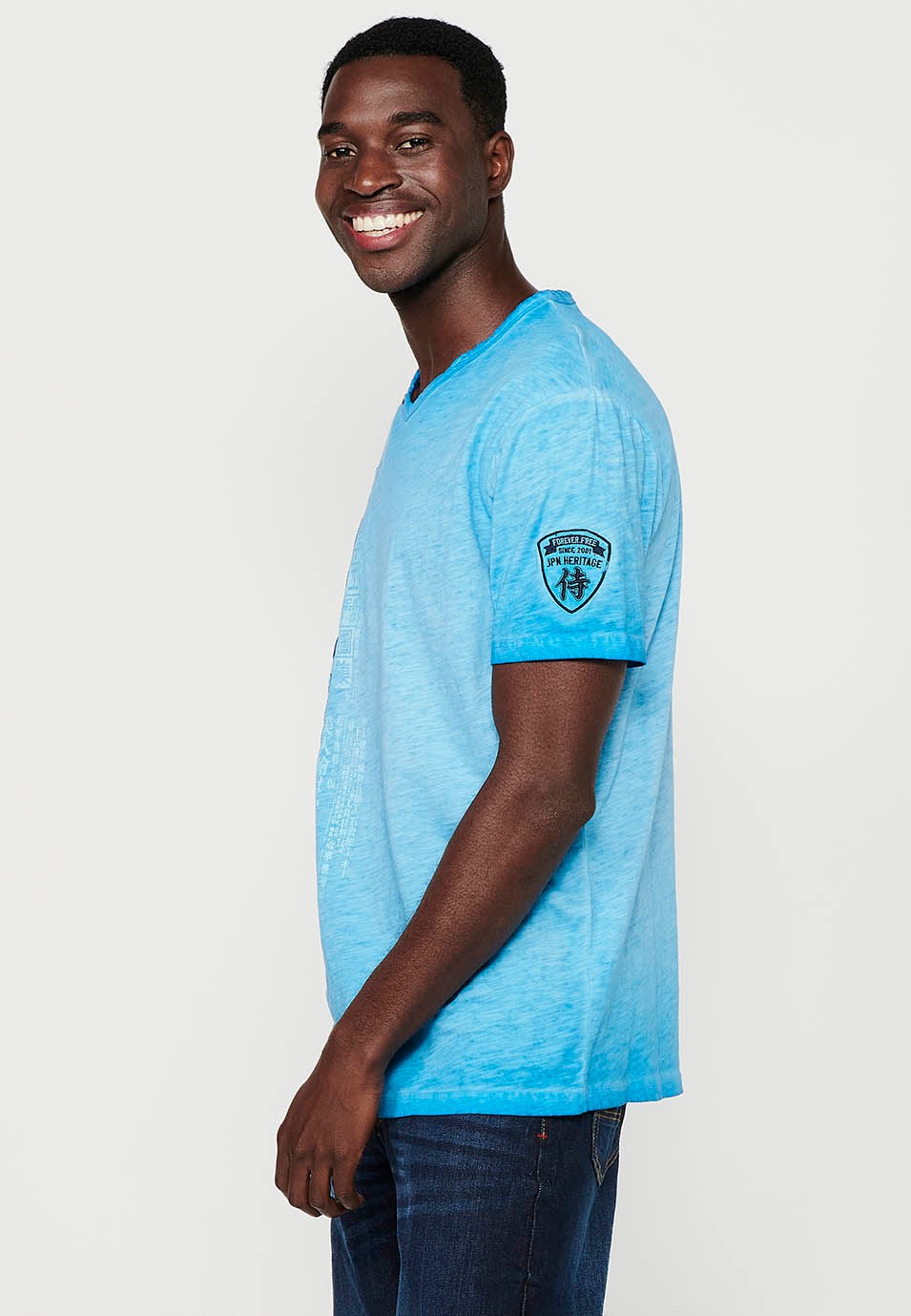 T-shirt en coton à manches courtes, col V avec décoration boutons, coloris bleu pour homme