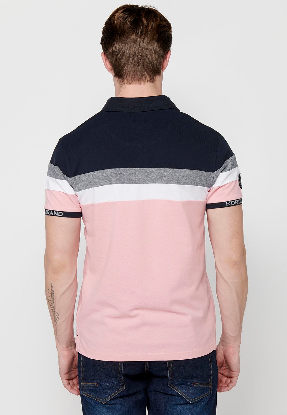 Polo de manga corta 100% algodon, detalle rayas en el pecho, color rosa para hombres