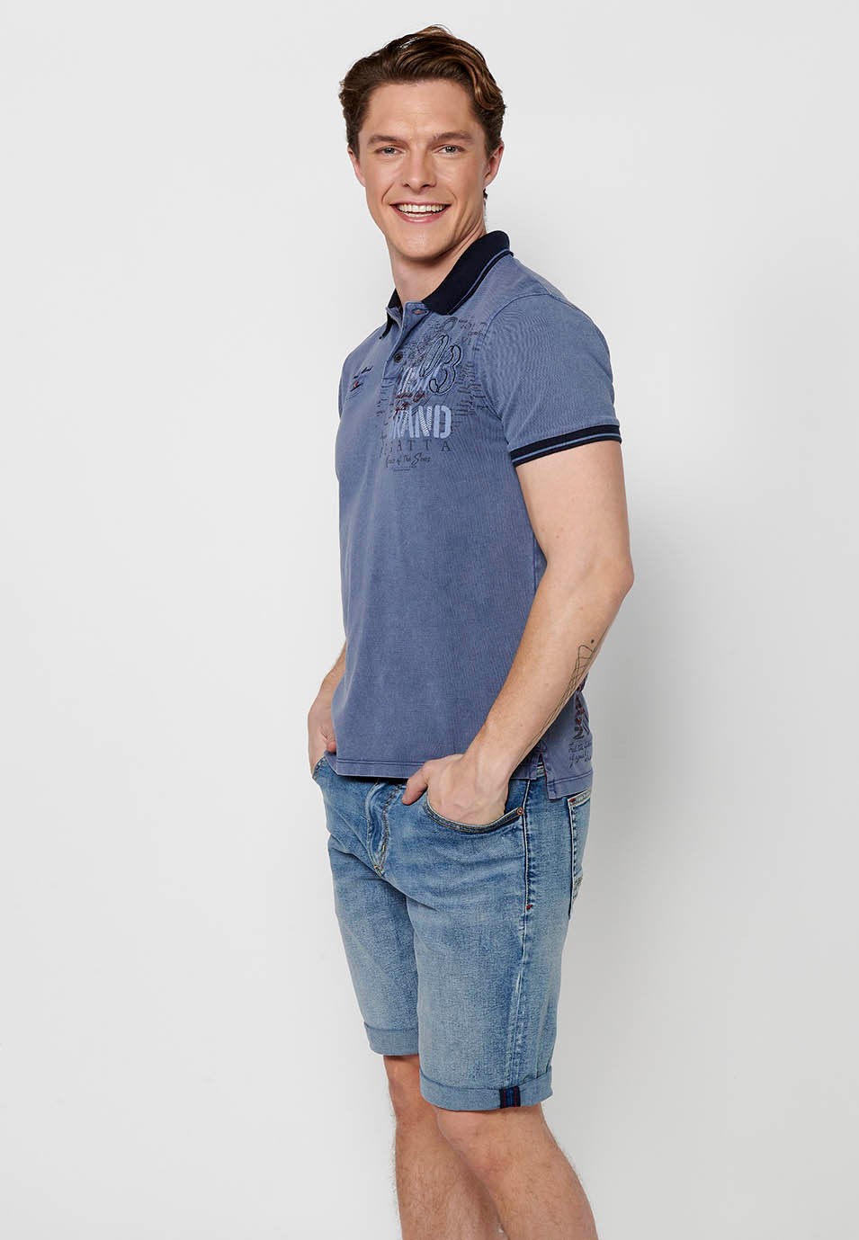 Polo manches courtes en coton, col chemise avec boutons, coloris bleu pour homme
