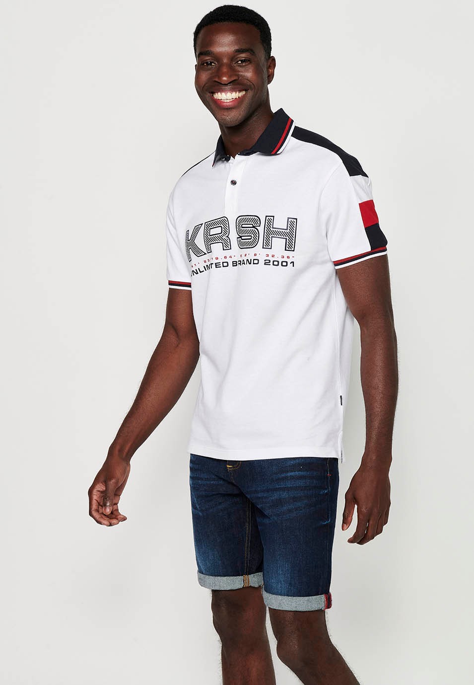 Short-sleeved cotton polo shirt with buttoned shirt collar and front detail with sleeves finished in rib and finished with side slits in White for Men