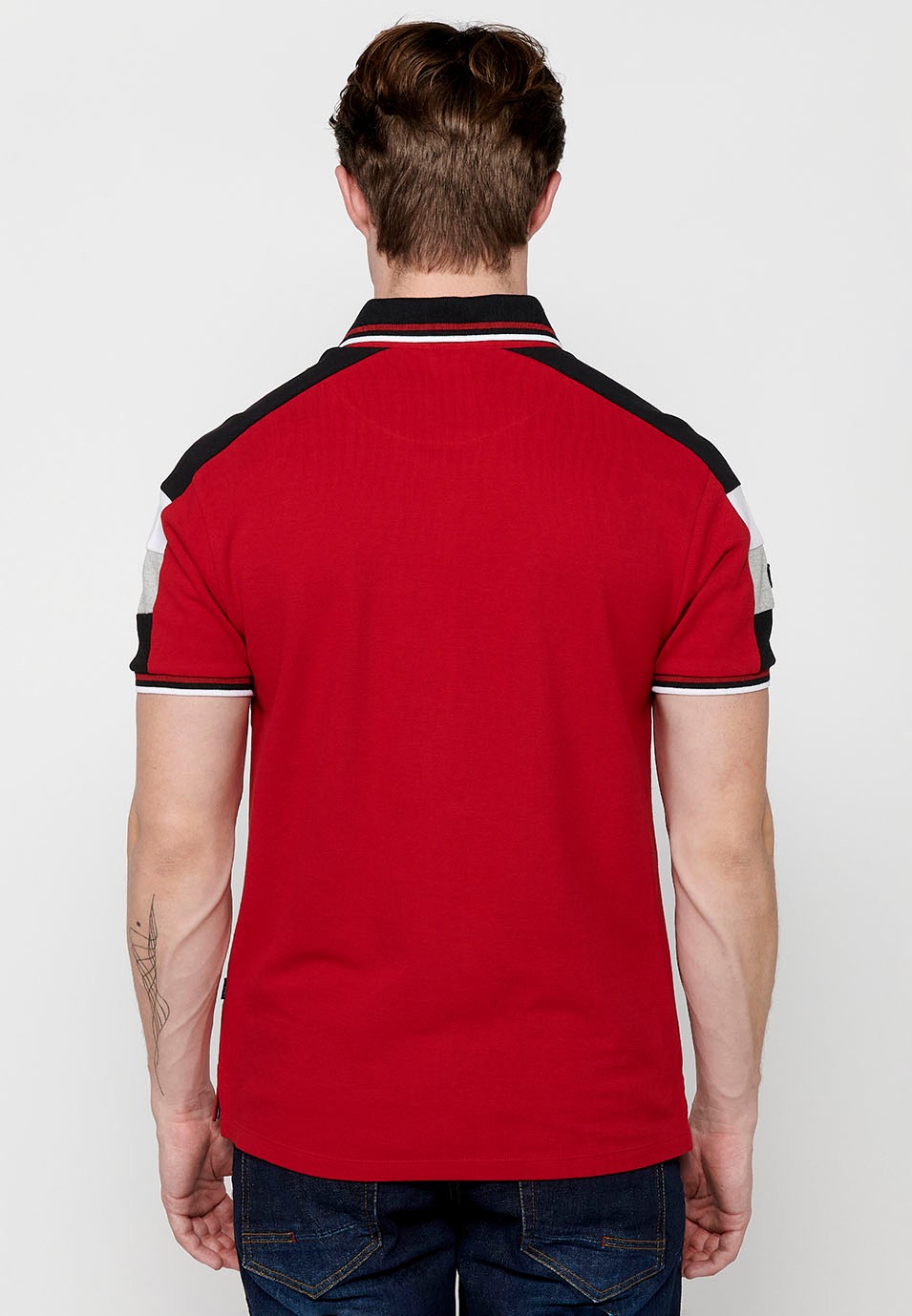 Short-sleeved cotton polo shirt with shirt collar with buttons and front detail with sleeves finished in rib and finished with side slits in Red for Men 1