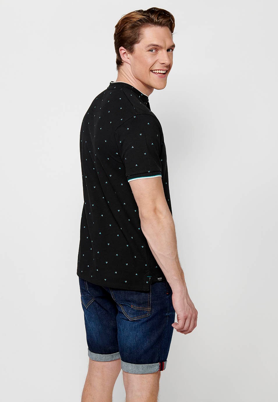 Short-sleeved Cotton Polo with Round Neck with buttoned opening and Finished with Side Cuts in Black for Men 1