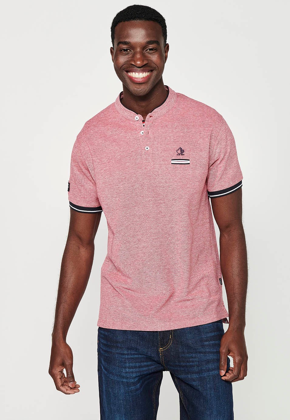 Short-sleeved cotton polo shirt with ribbed finish with round neck with buttoned opening and red side slits for men