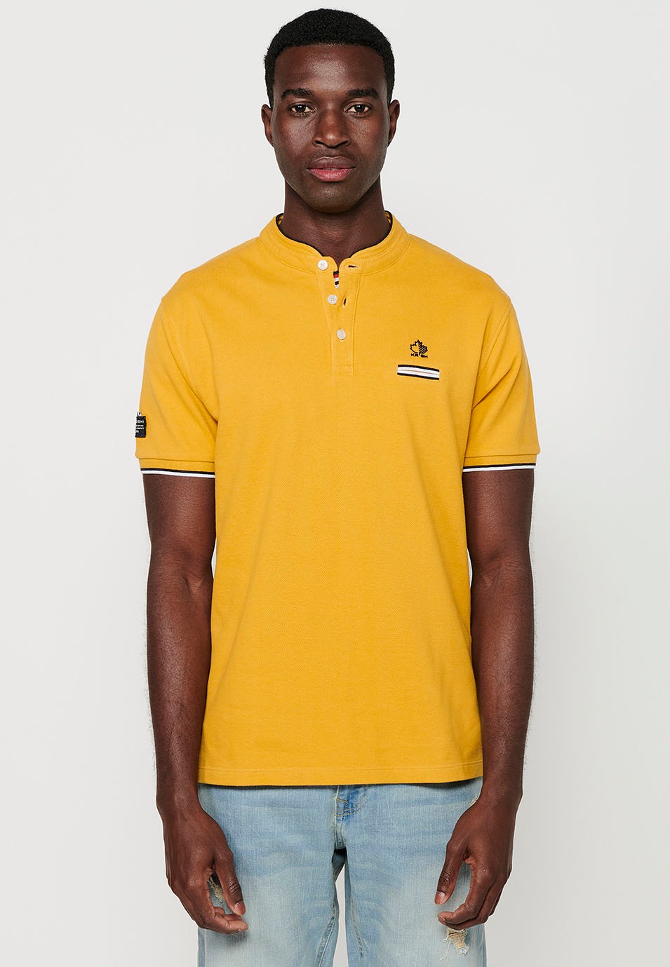 Short-sleeved cotton polo shirt with ribbed finish with round neck with buttoned opening and yellow side slits for men 6