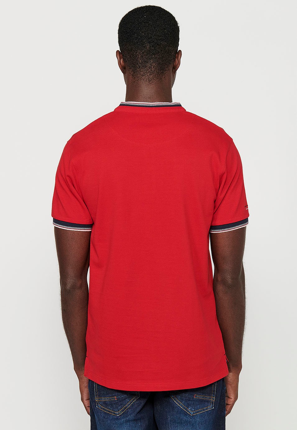 Short-sleeved cotton polo shirt finished in rib with a round neck with buttoned opening and textured with side slits in Red for Men 2
