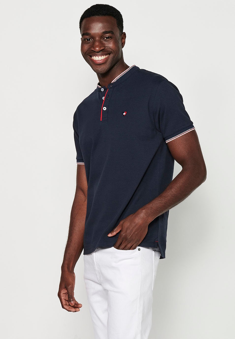 Short-sleeved cotton polo shirt with ribbed finish with round neck, buttoned opening and textured side slits in Navy Color for Men 2