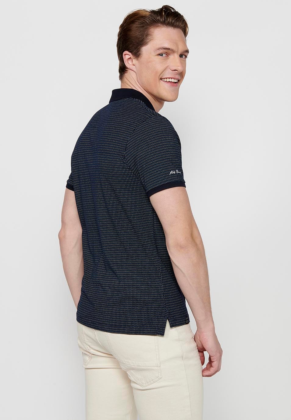 Short-sleeved cotton polo shirt with ribbed finish and buttoned shirt collar with printed fabric and finished with side slits by Navy for Men