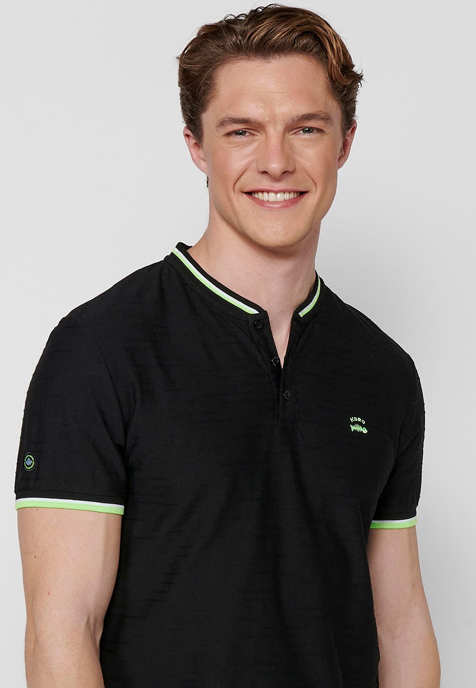 Short-sleeved Polo Shirt with Round Neck with buttoned opening and Finish with side slits in Black for Men 1