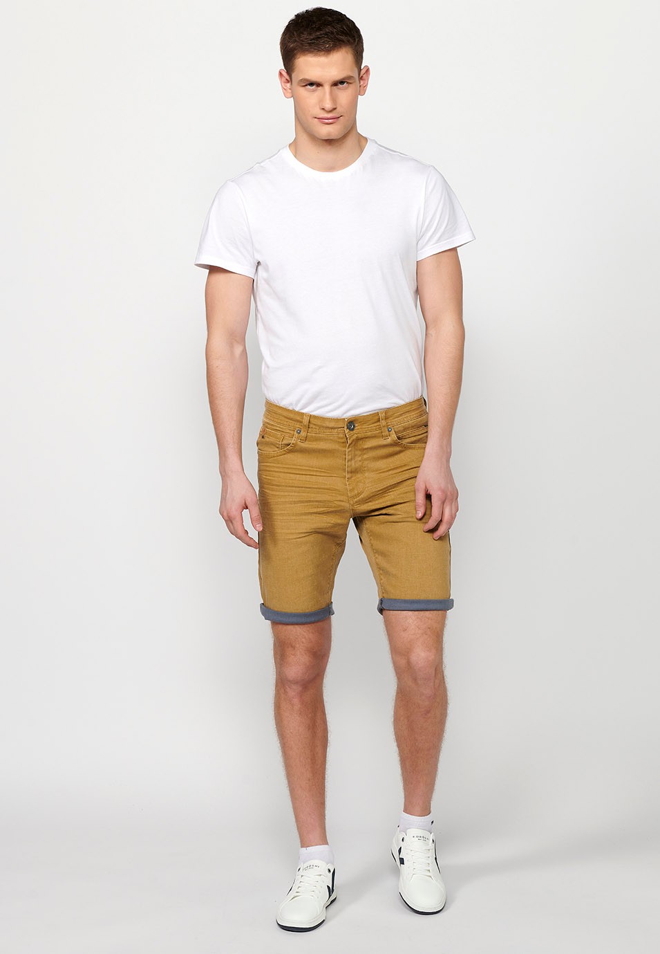 Denim Bermuda shorts with turn-up finish, front closure with zipper and button, with five pockets, one pocket pocket, Ocher Color for Men