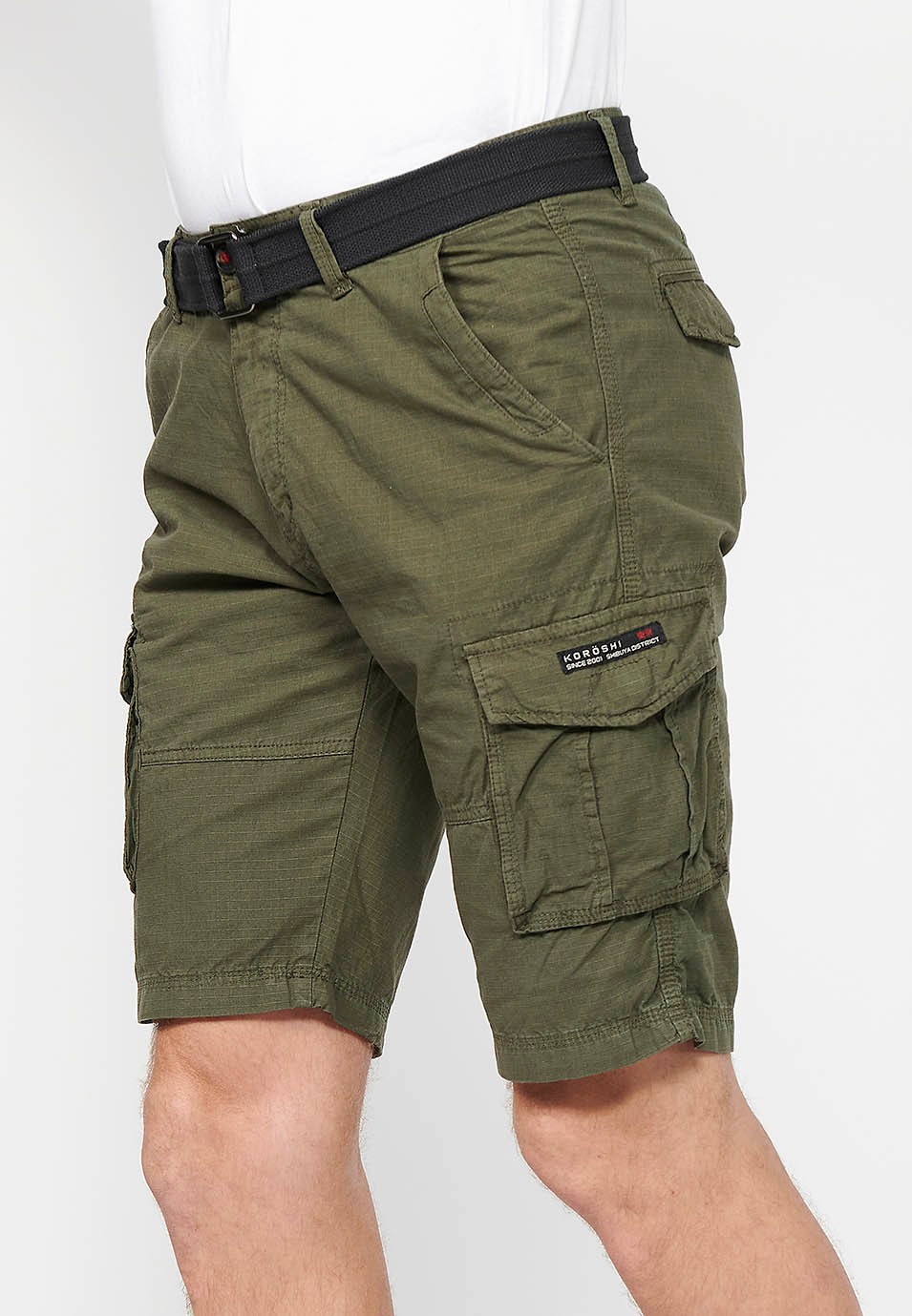 Cotton cargo shorts with belt and front closure with zipper and button with pockets, two back pockets with flap and two green cargo pants for Men 1
