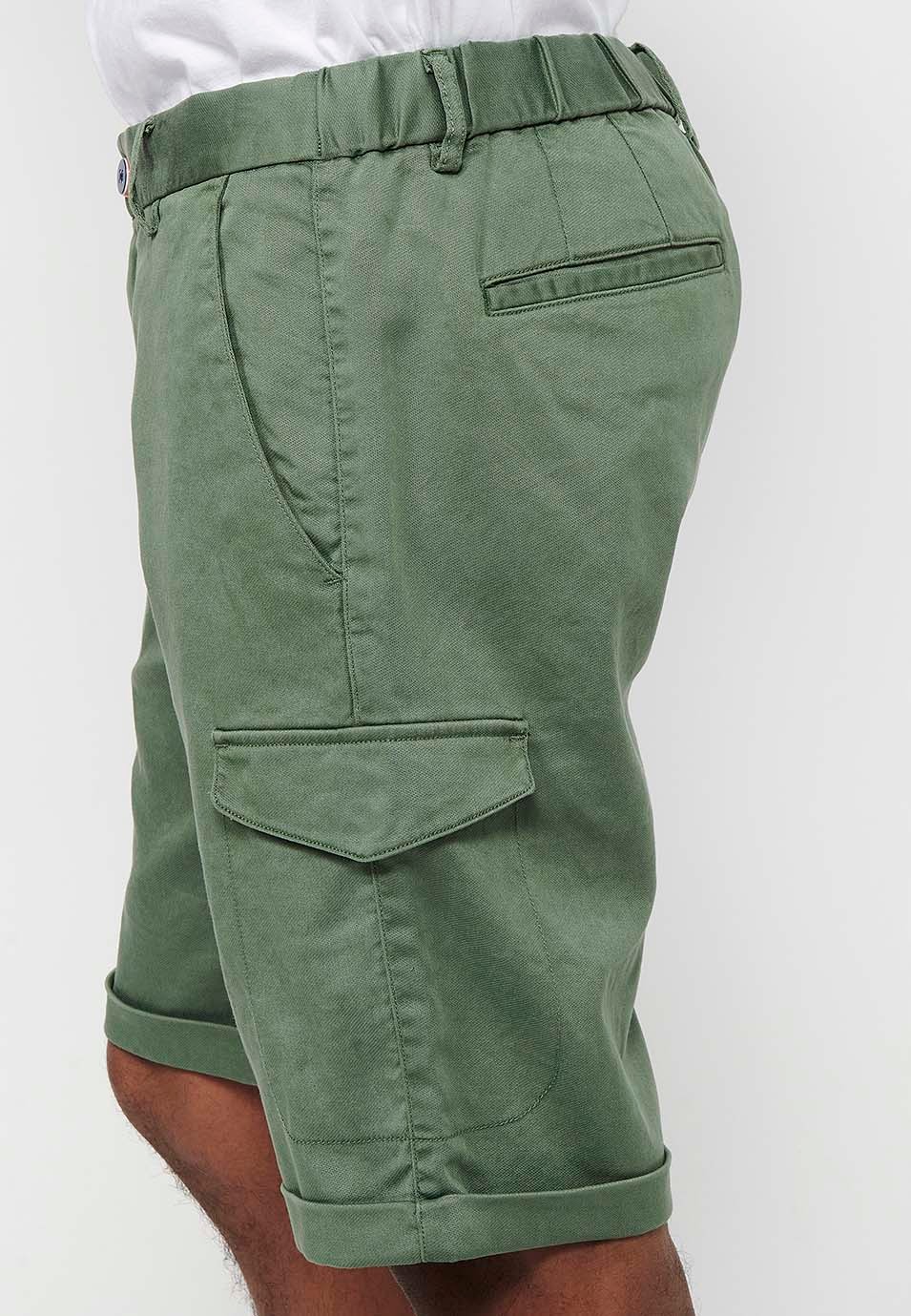 Shorts with rubberized waist and zipper and button closure with pockets, two sides with flap in Green for Men 6