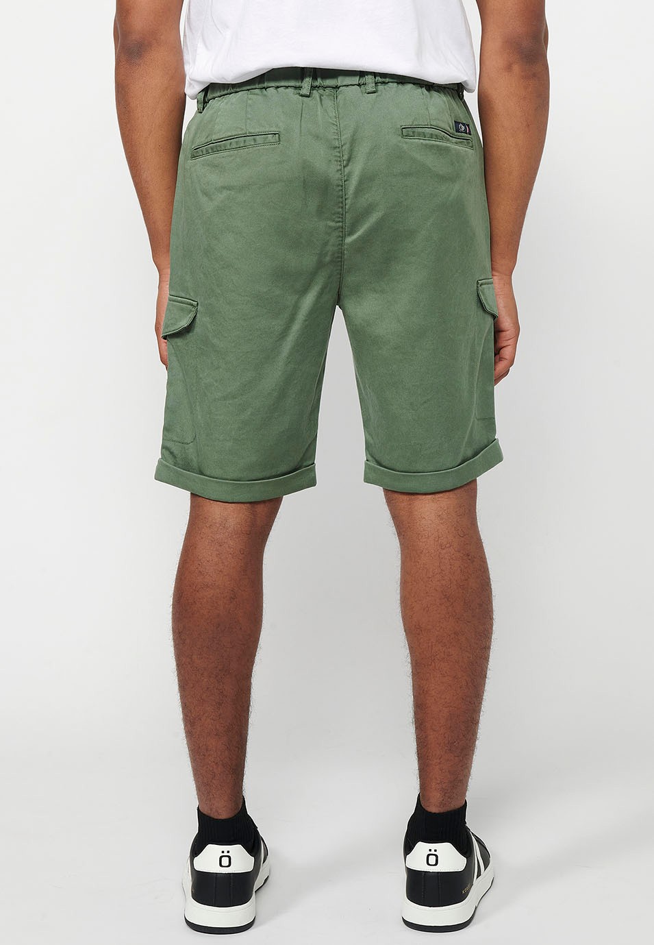 Shorts with rubberized waist and zipper and button closure with pockets, two sides with flap in Green for Men 2