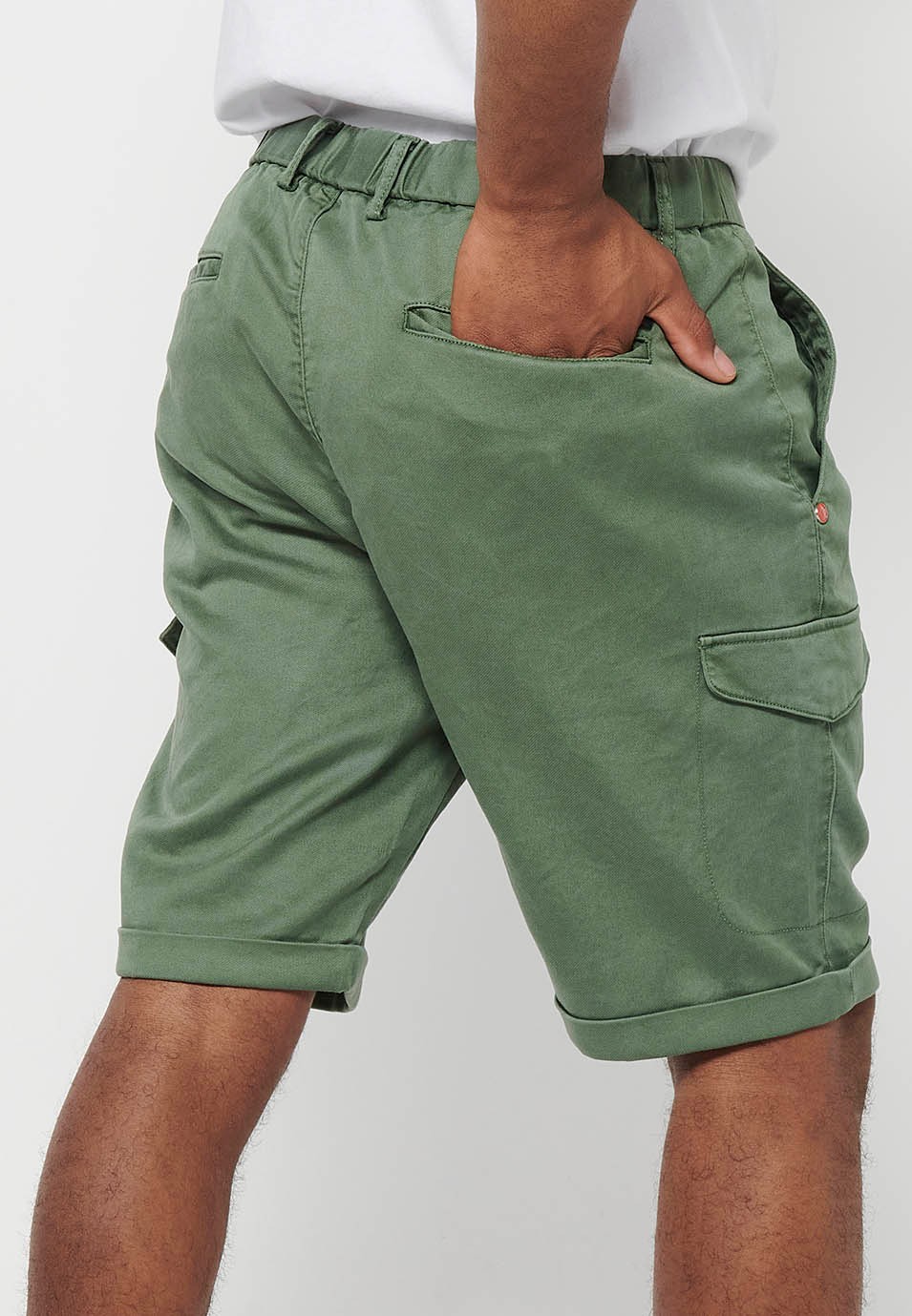 Shorts with rubberized waist and zipper and button closure with pockets, two sides with flap in Green for Men 9