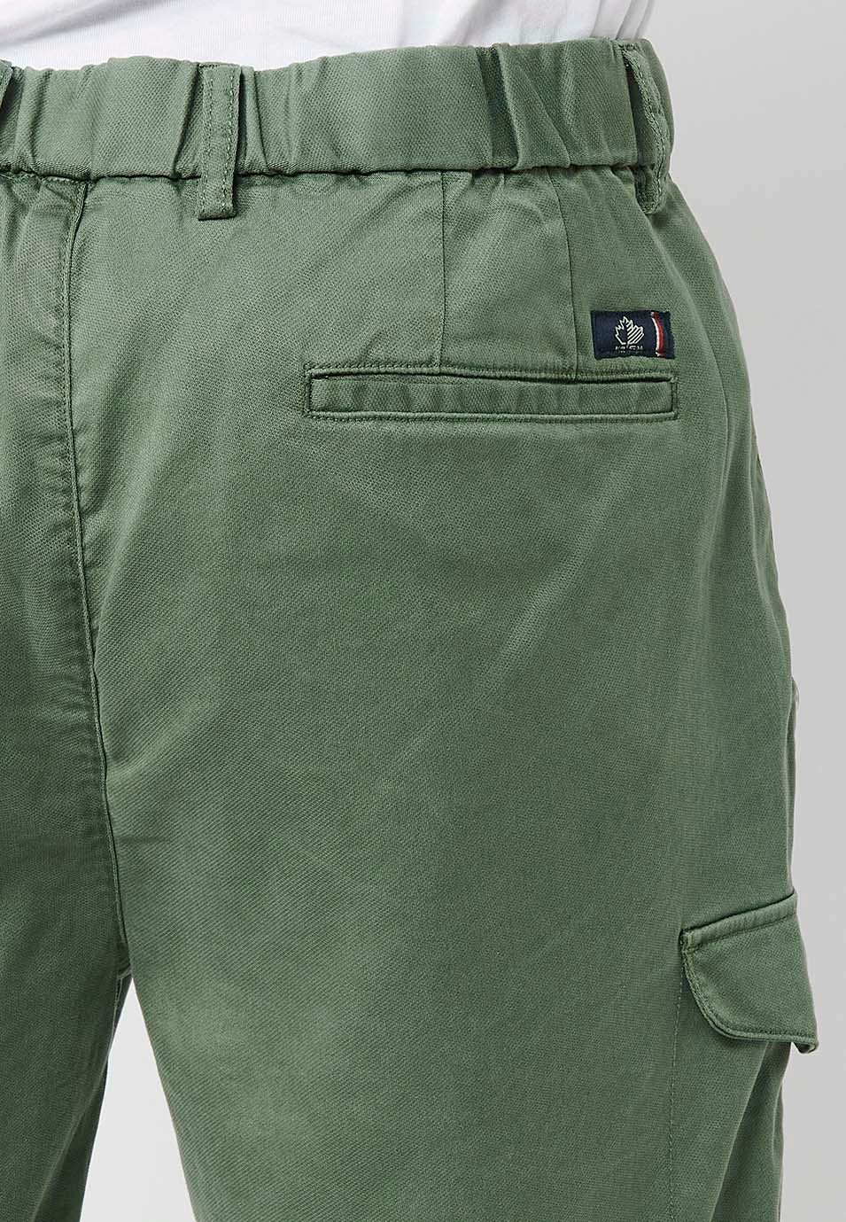 Shorts with rubberized waist and zipper and button closure with pockets, two sides with flap in Green for Men 7