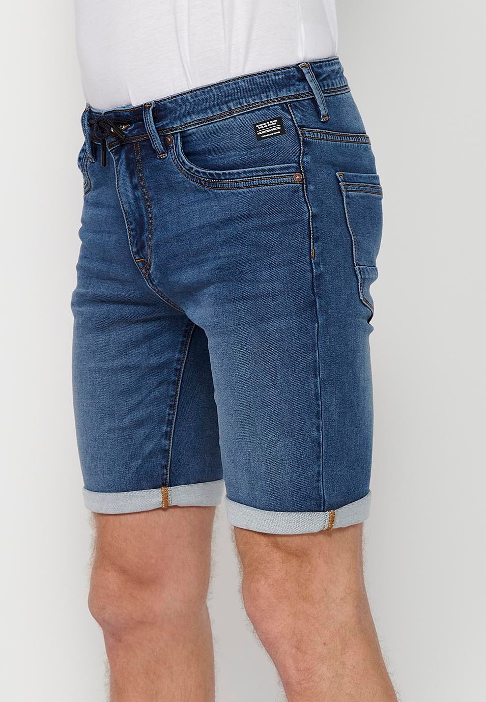 Shorts mit Umschlag und Frontverschluss mit Reißverschluss und Knopf in Blau für Herren