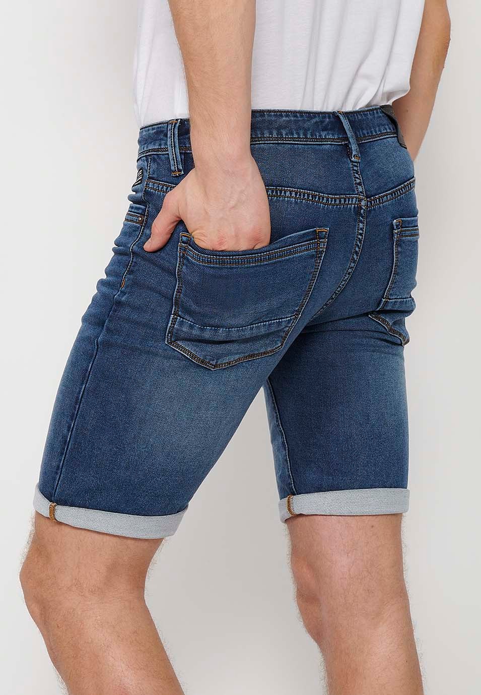 Short avec finition revers avec fermeture sur le devant avec fermeture éclair et bouton en Bleu pour Homme