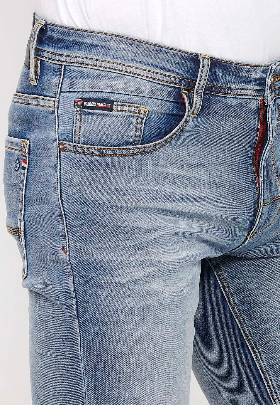 Bermuda en denim bleu avec finition revers et fermeture éclair et bouton sur le devant pour homme 9