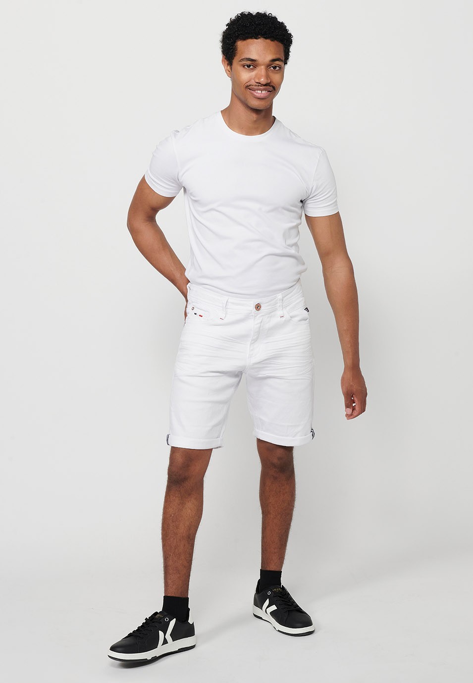 Denim Bermuda shorts with turn-up finish and front closure with zipper and button in White for Men