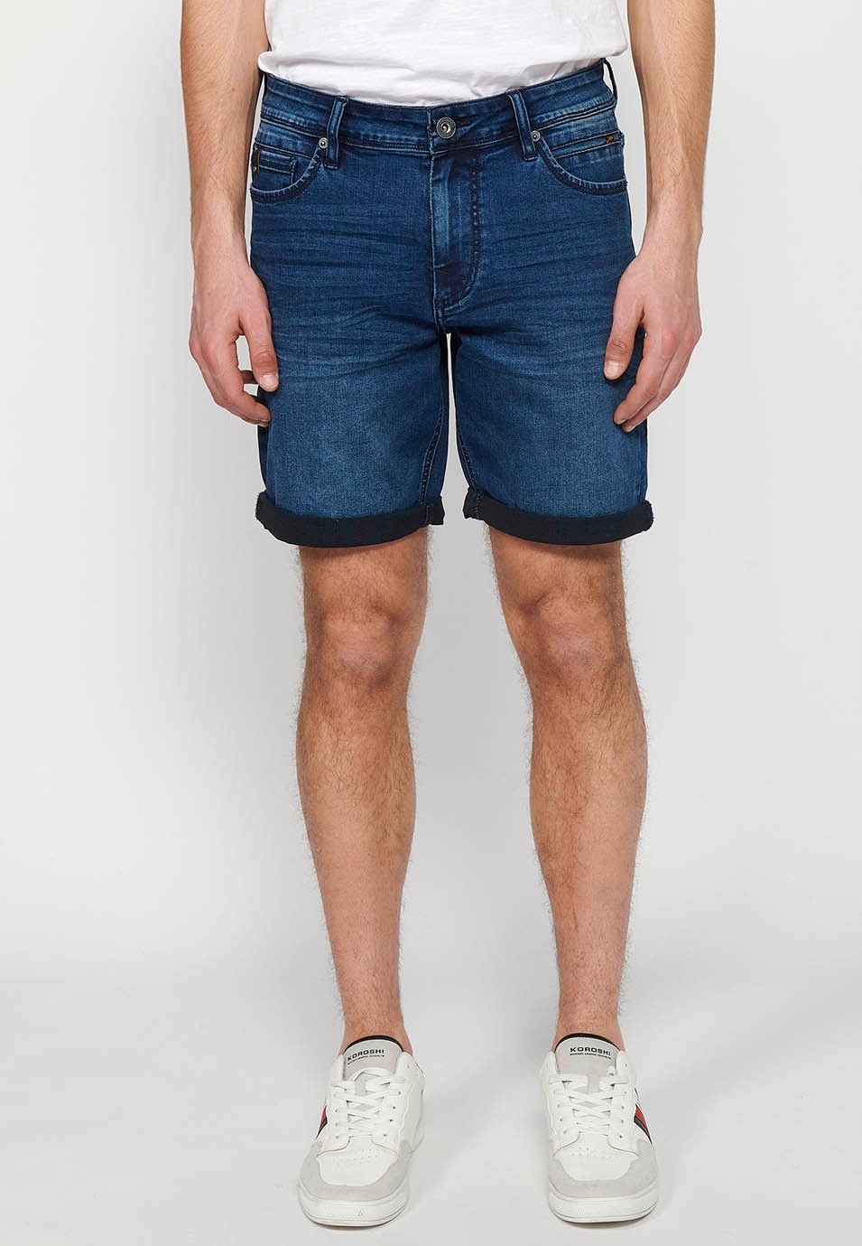 Denim shorts with front zipper and button closure and five pockets, one blue color pocket for Men