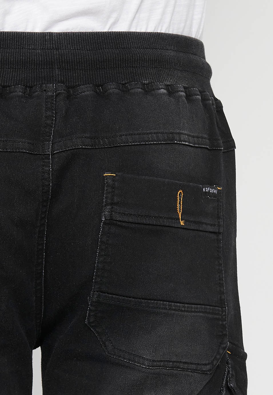Denim Bermuda cargo jogger shorts finished with a turn-up, Adjustable waist with elastic and drawstring, Side pockets with flap, Black for Men 5