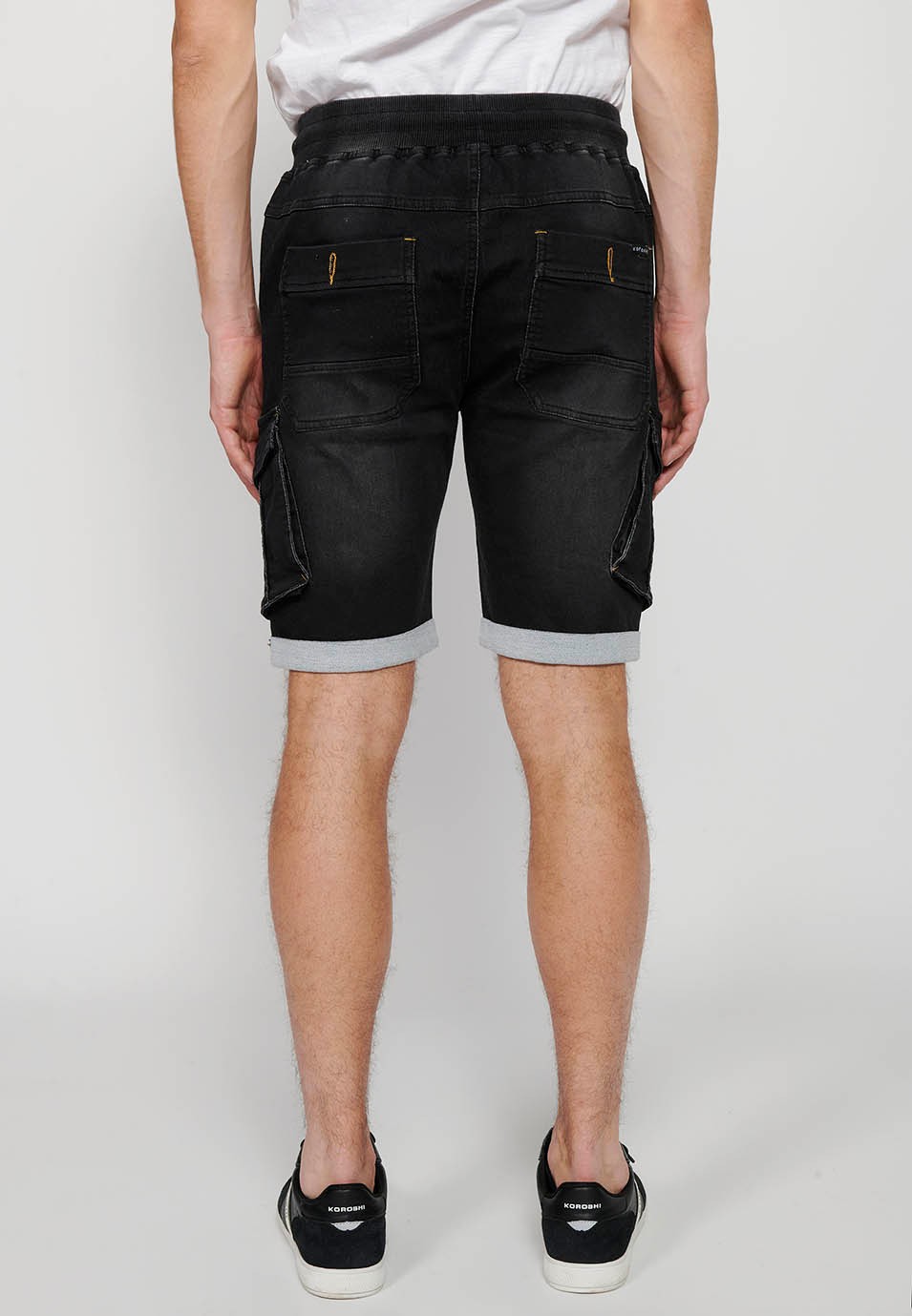 Denim Bermuda cargo jogger shorts finished with a turn-up, Adjustable waist with elastic and drawstring, Side pockets with flap, Black for Men 3