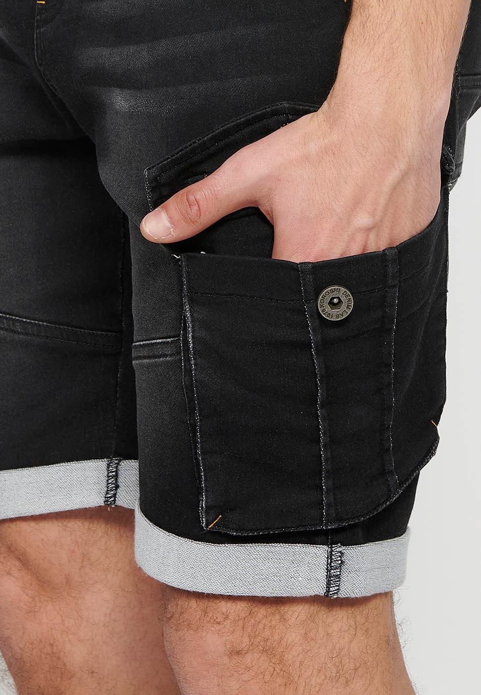 Denim Bermuda cargo jogger shorts finished with a turn-up, Adjustable waist with elastic and drawstring, Side pockets with flap, Black for Men 9