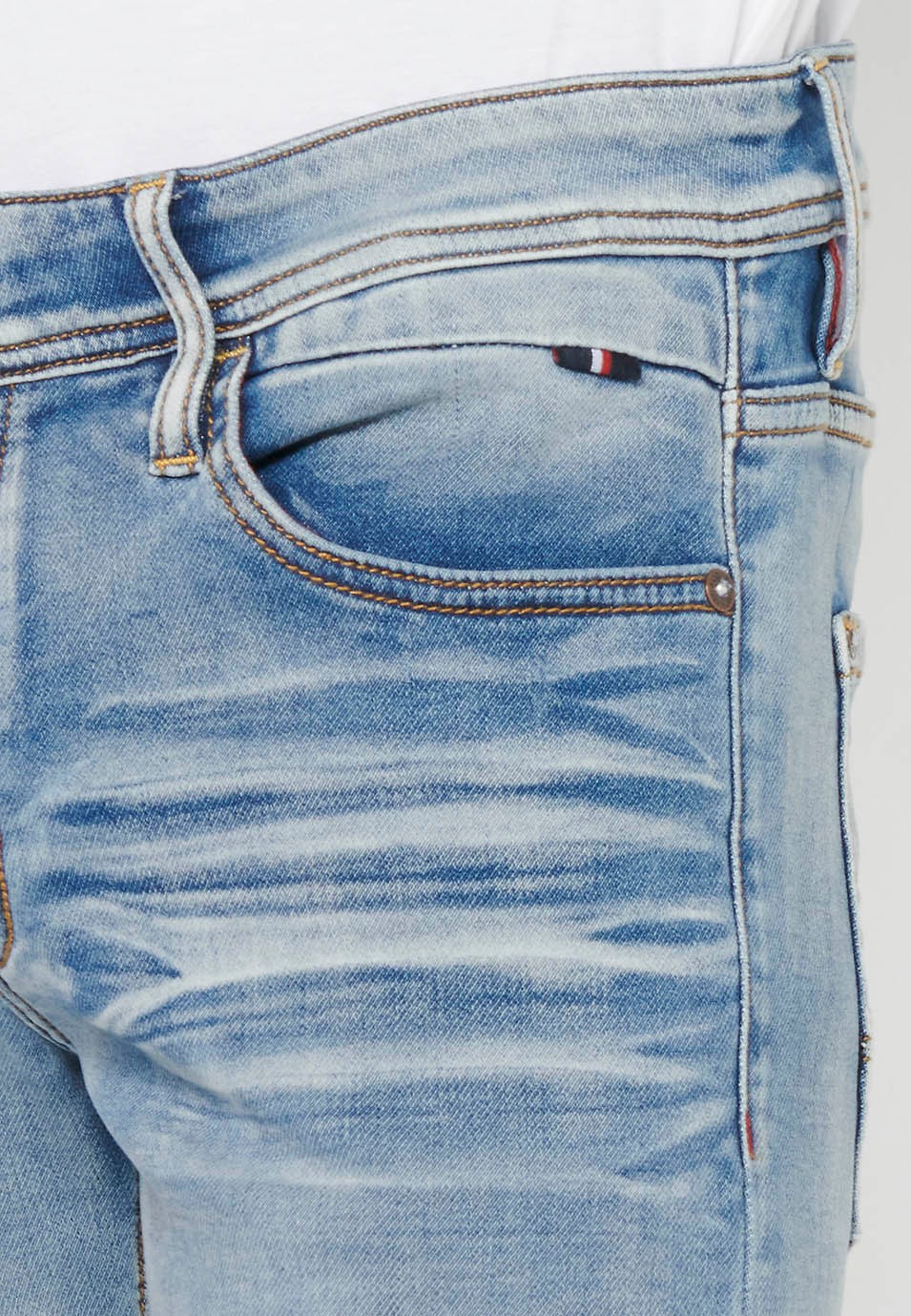 Slim fit long denim pants with front zipper closure and light blue button for Men 6