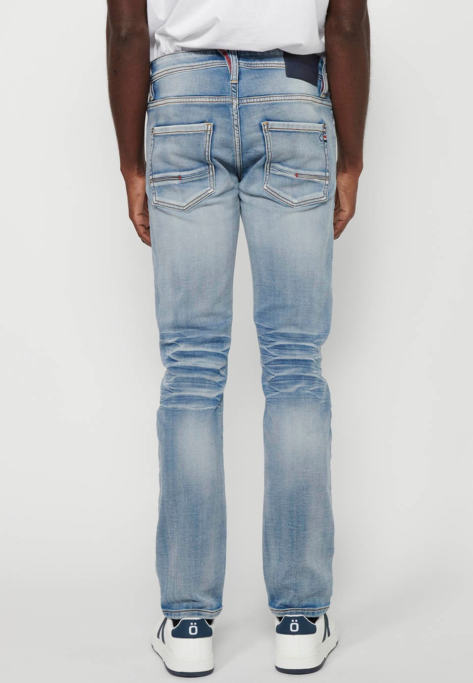 Slim fit long denim pants with front zipper closure and light blue button for Men 9