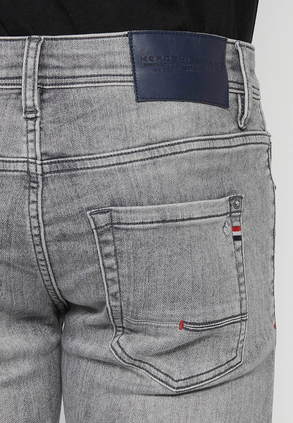 Pantalon long en jean coupe slim cinq poches dont une poche en Denim Gris pour Homme