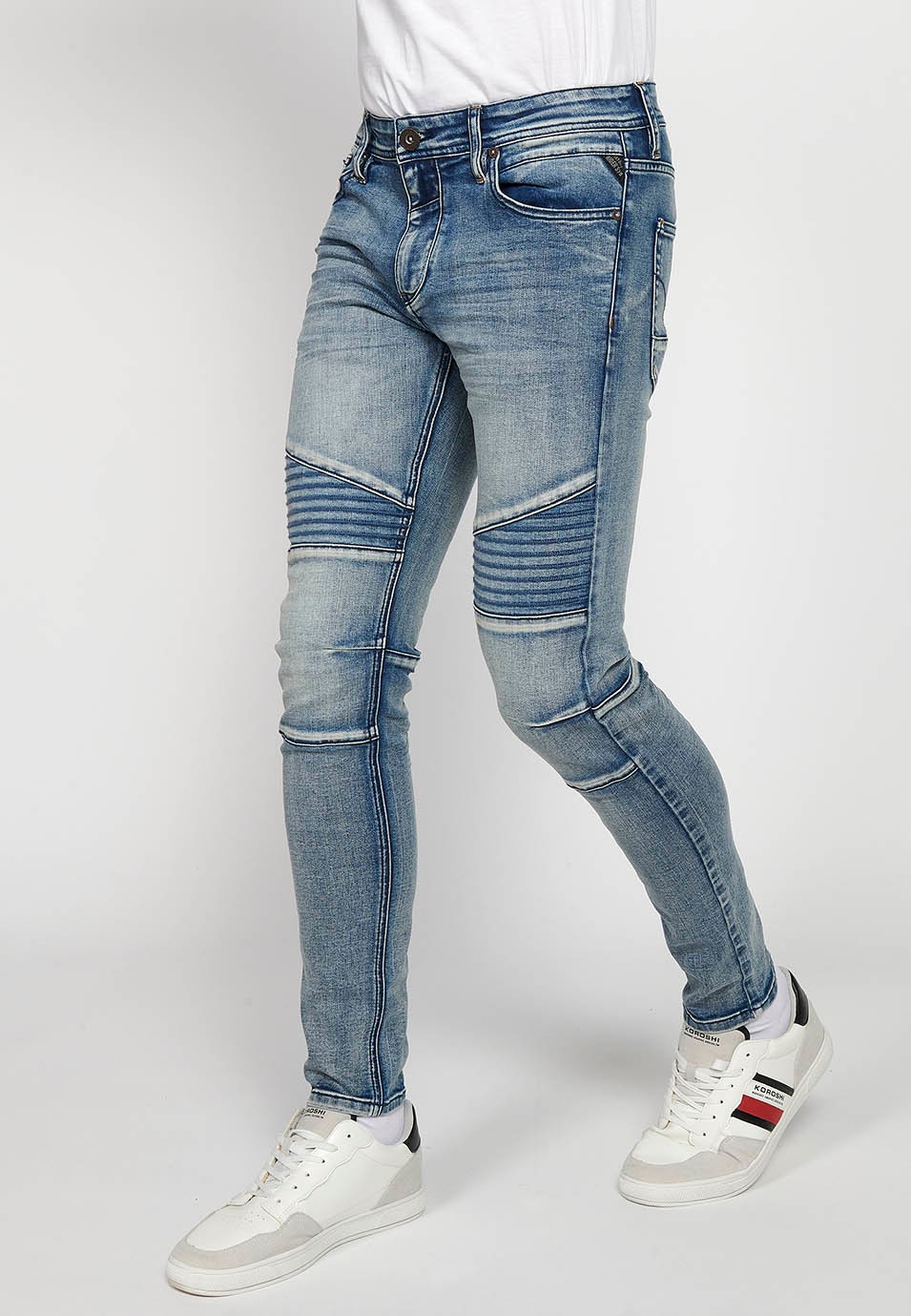 Long skinny fit biker jeans with front zipper and button closure and cut details on the knees in Blue for Men 2