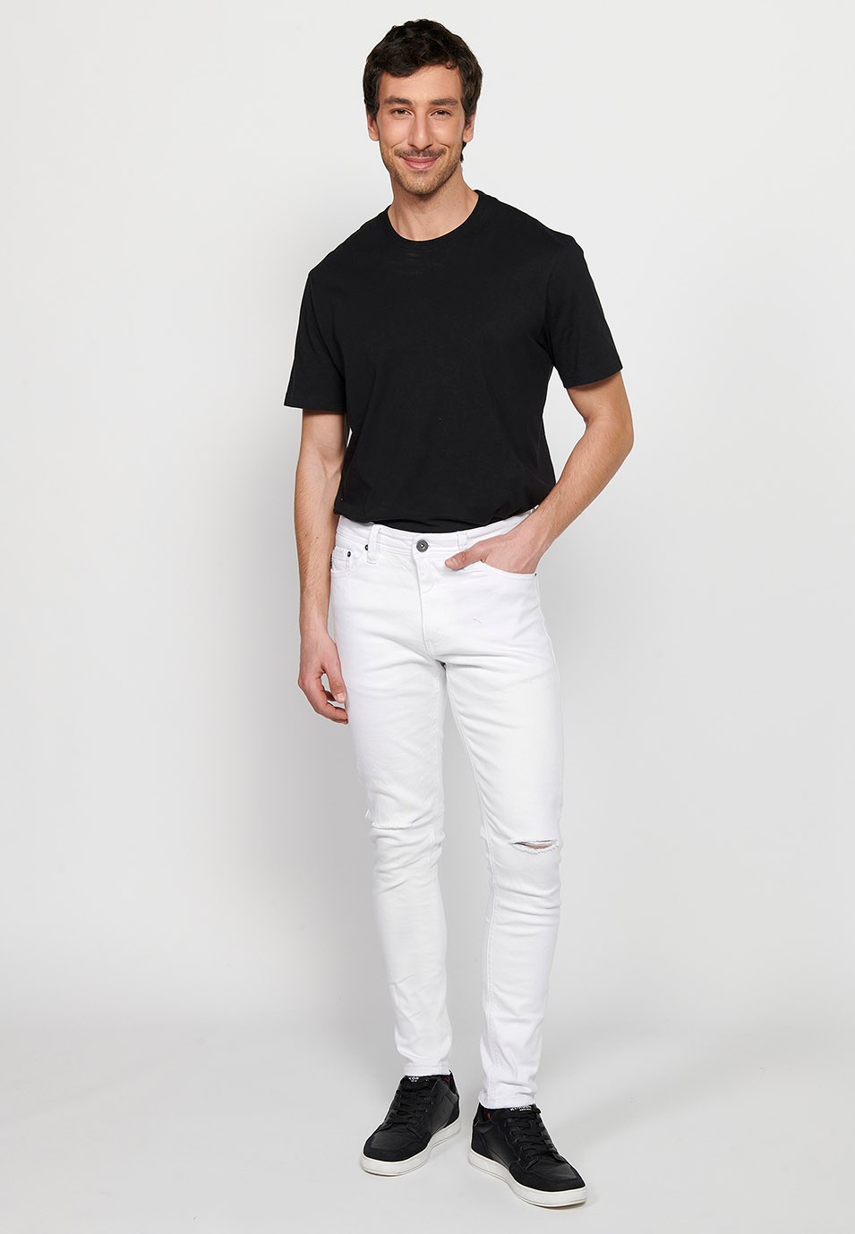 Super skinny jeans with front closure with zipper and button in White Denim for Men
