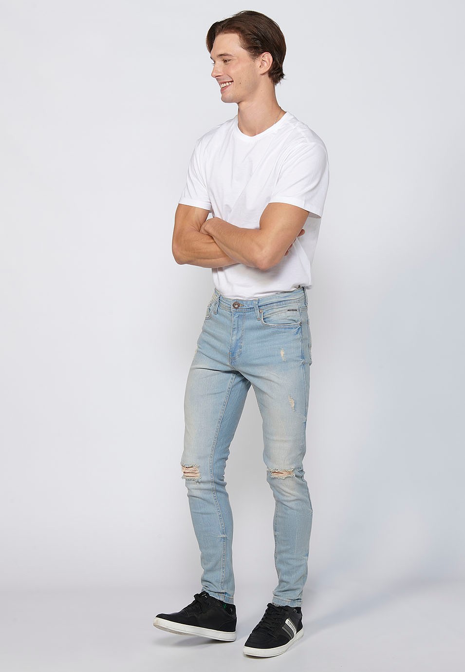 Pantalon long coupe super skinny avec fermeture éclair et bouton en Bleu pour Homme