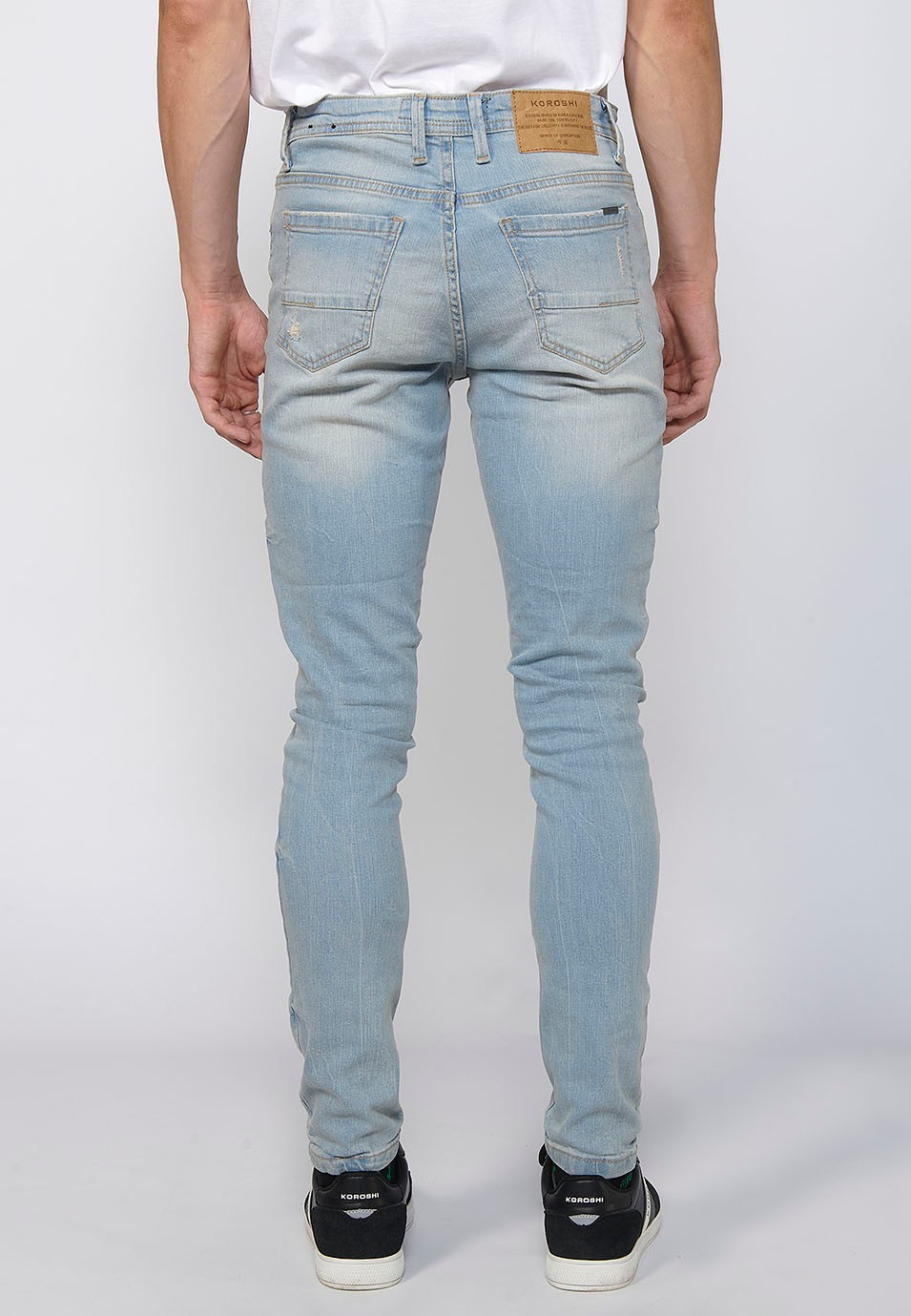 Pantalón largo super skinny fit con cierre con cremallera y botón color Azul para Hombre 1