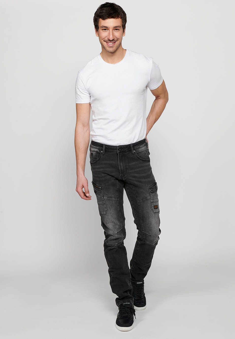 Long denim pants with front closure with zipper and button and pockets, two sides in Black for Men