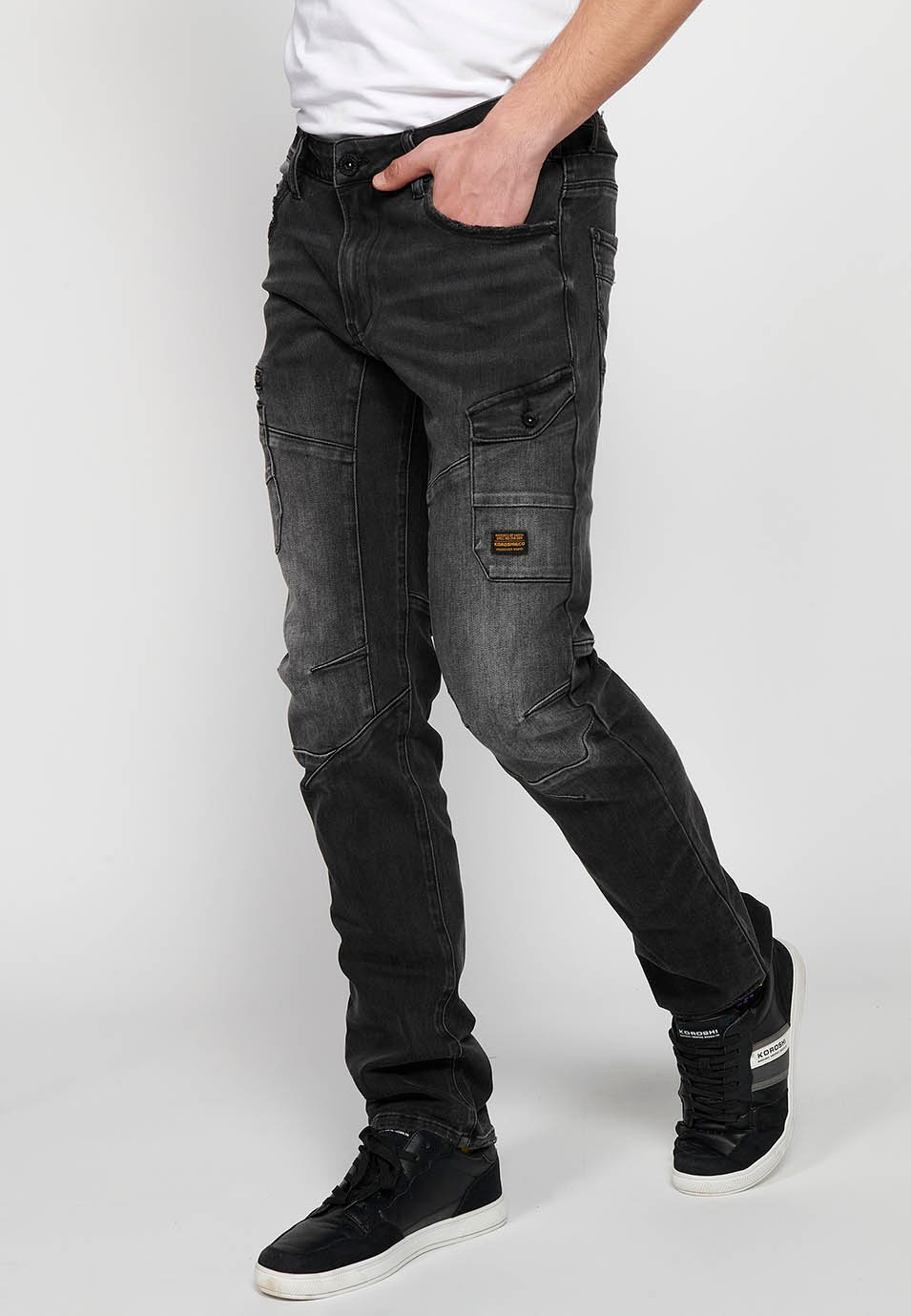 Long denim pants with front closure with zipper and button and pockets, two sides in Black for Men 3