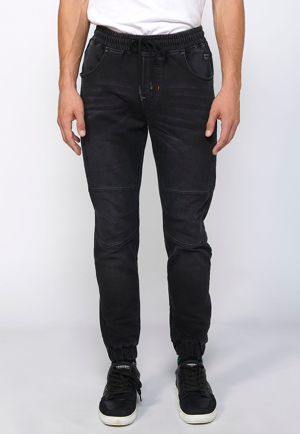 Long slim jogger pants fitted at the ankles with adjustable elastic waist and drawstring in Black for Men 4